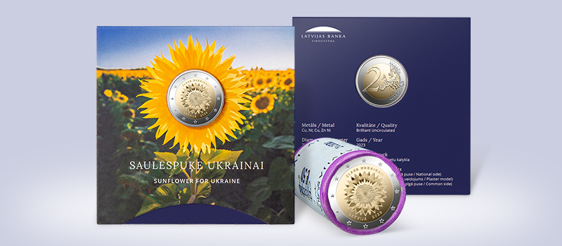 2 eiro piemiņas monēta Saulespuķe Ukrainai rullī un suvenīriesaiņojumā